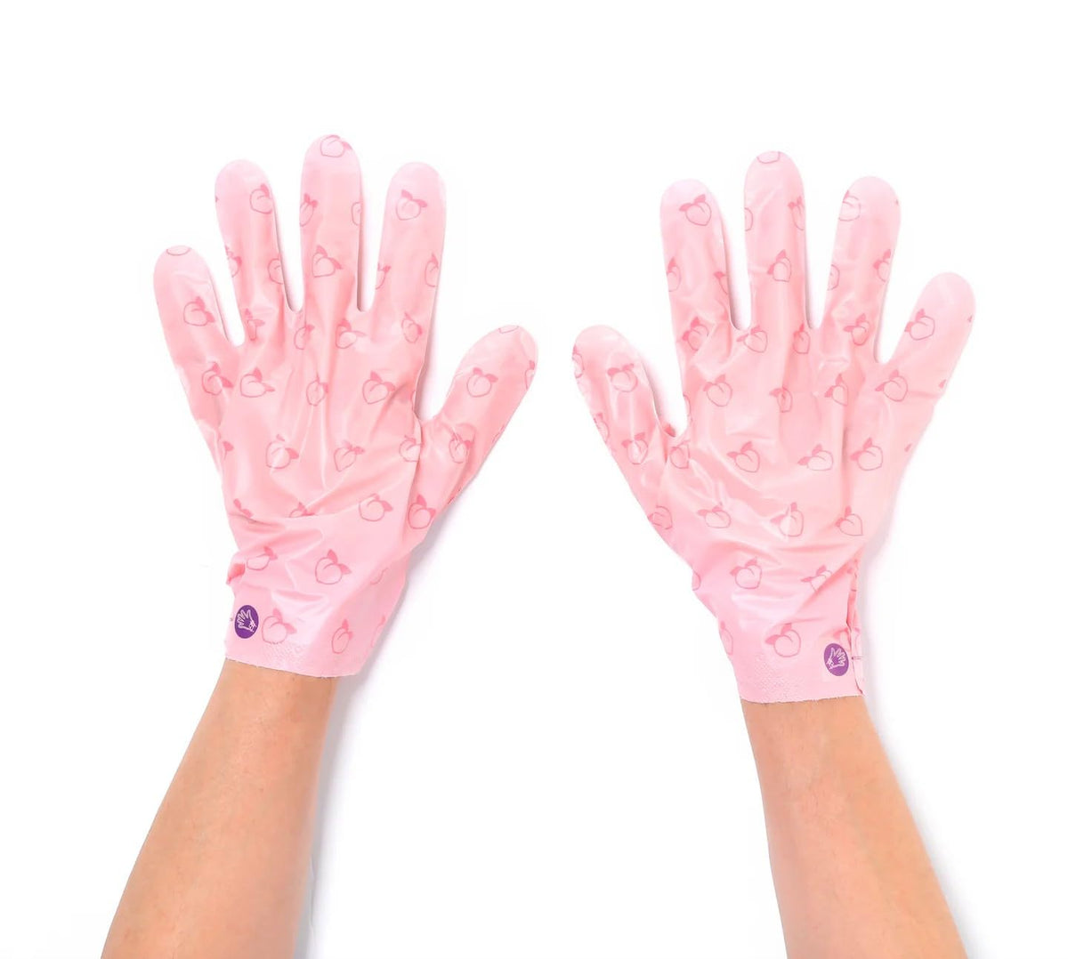 TONYMOLY I'm Lovely Peach Hand Mask application shows multitasking while moisturizing