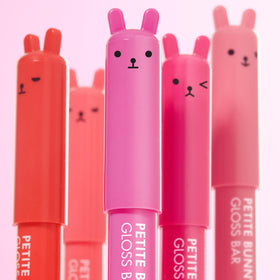 TONYMOLY Petit Bunny Lip Gloss Pack cap characters showing fun expressions for daily wear.