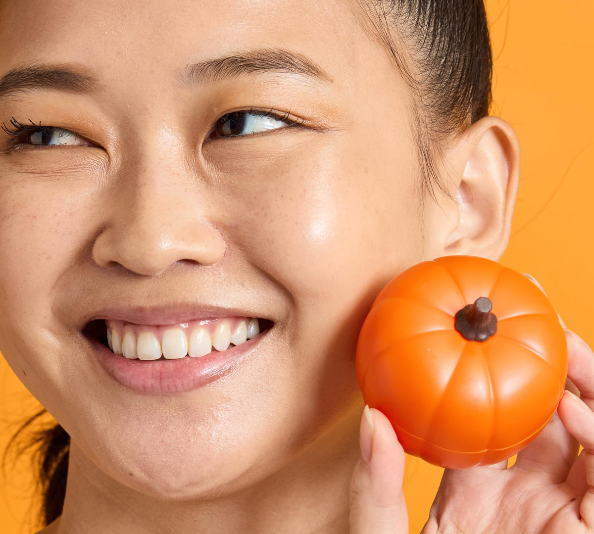 TONYMOLY Plump-kin Eye Cream packaging box close-up communicates premium skincare.
