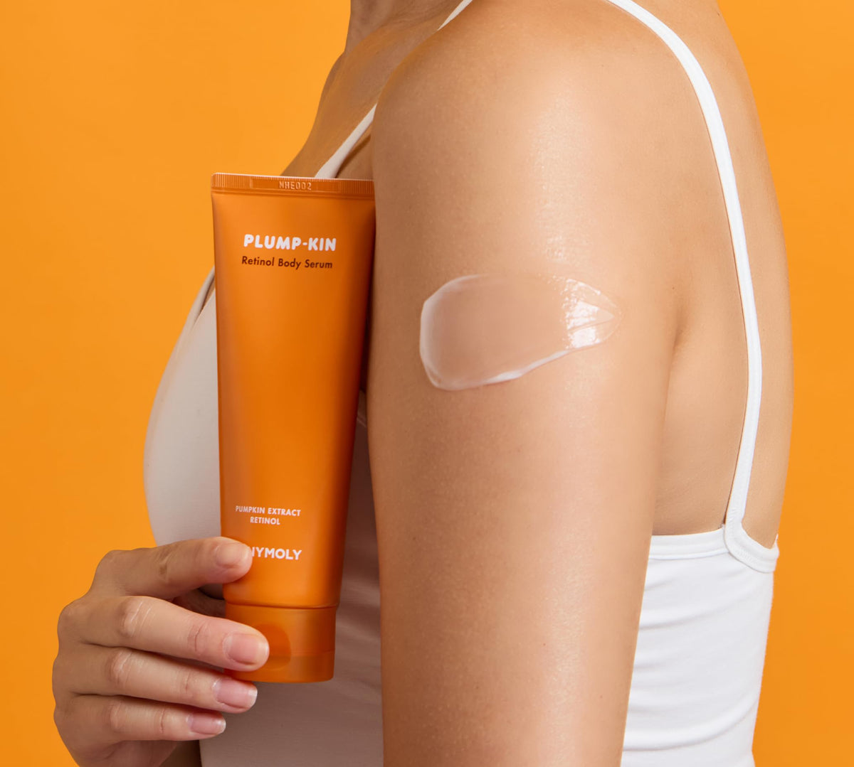 TONYMOLY Plumpkin Retinol Body Serum ready for face and body application to target roughness.