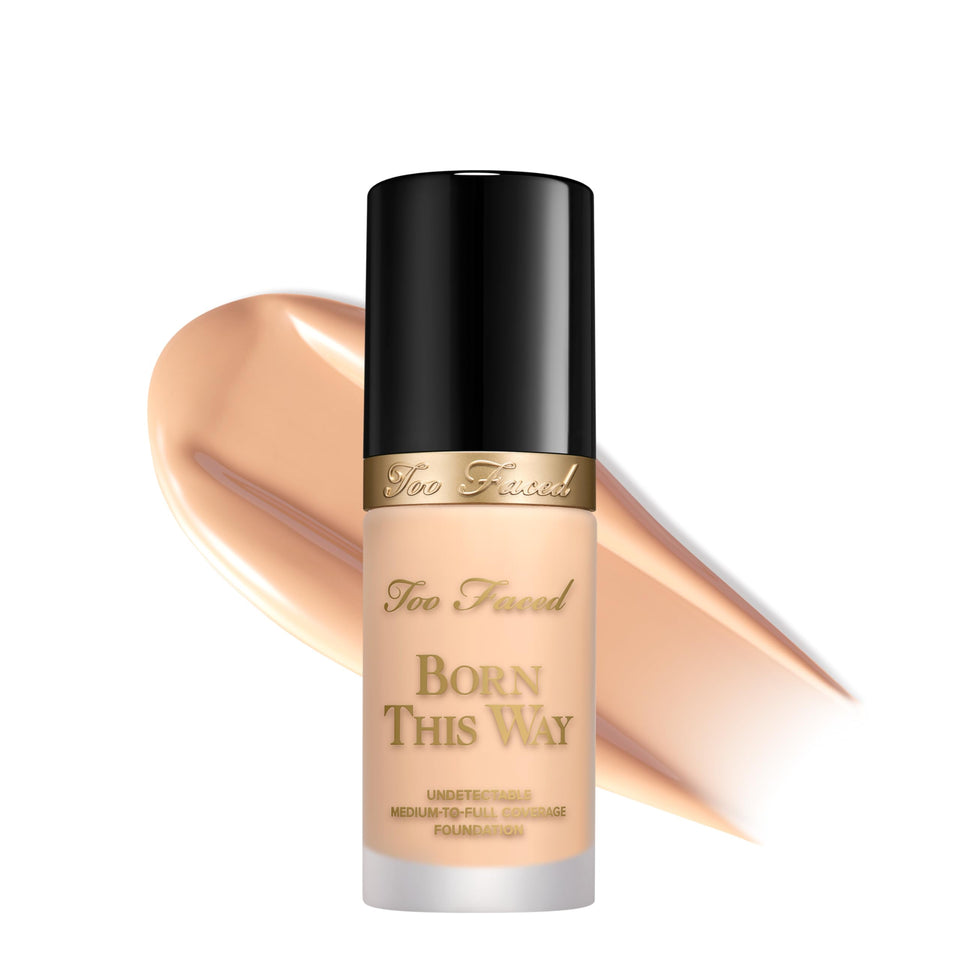 Too Faced Born This Way bottle dispense shows precise application for natural coverage.