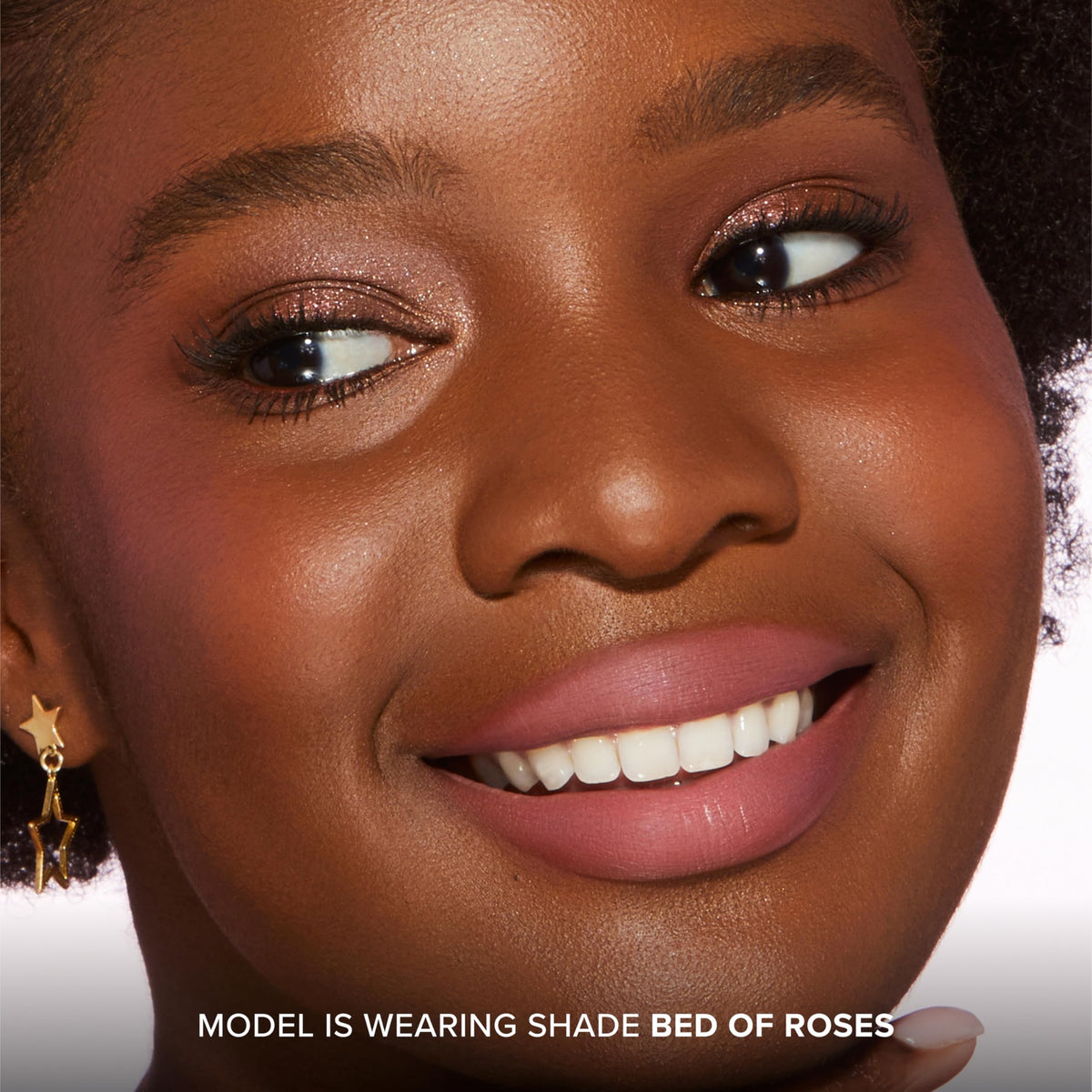 Too Faced Cloud Crush lip-cheek application shows quick color in a swipe.