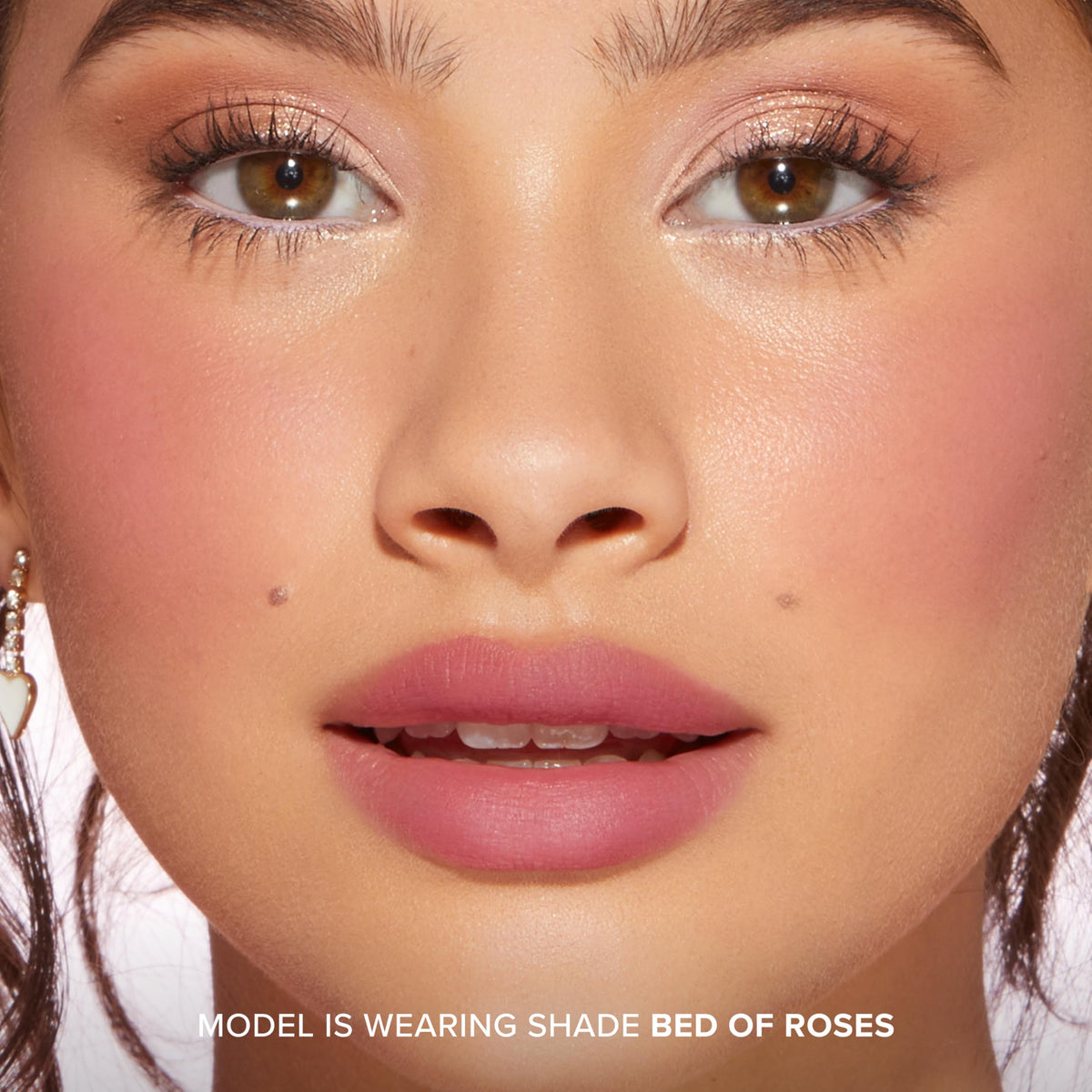 Too Faced Cloud Crush packaging with rose-gold cap signals premium presentation.