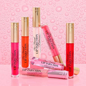 Too Faced Lip Injection Extreme on lips during application for plump, glossy finish.
