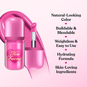 Too Faced Love Flush liquid blush swatch on cheek shows buildable color.