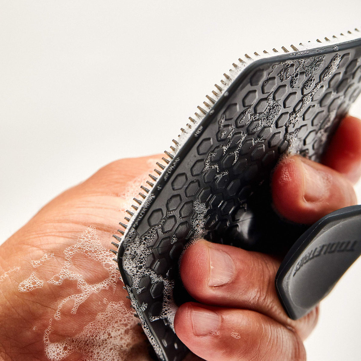 TOOLETRIES Body Scrubber made of durable silicone.