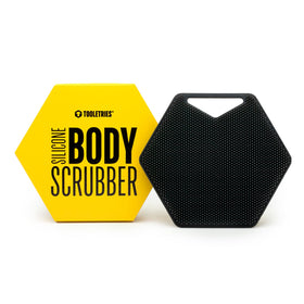 TOOLETRIES Body Scrubber close-up reveals bespoke bristles for deep cleansing.