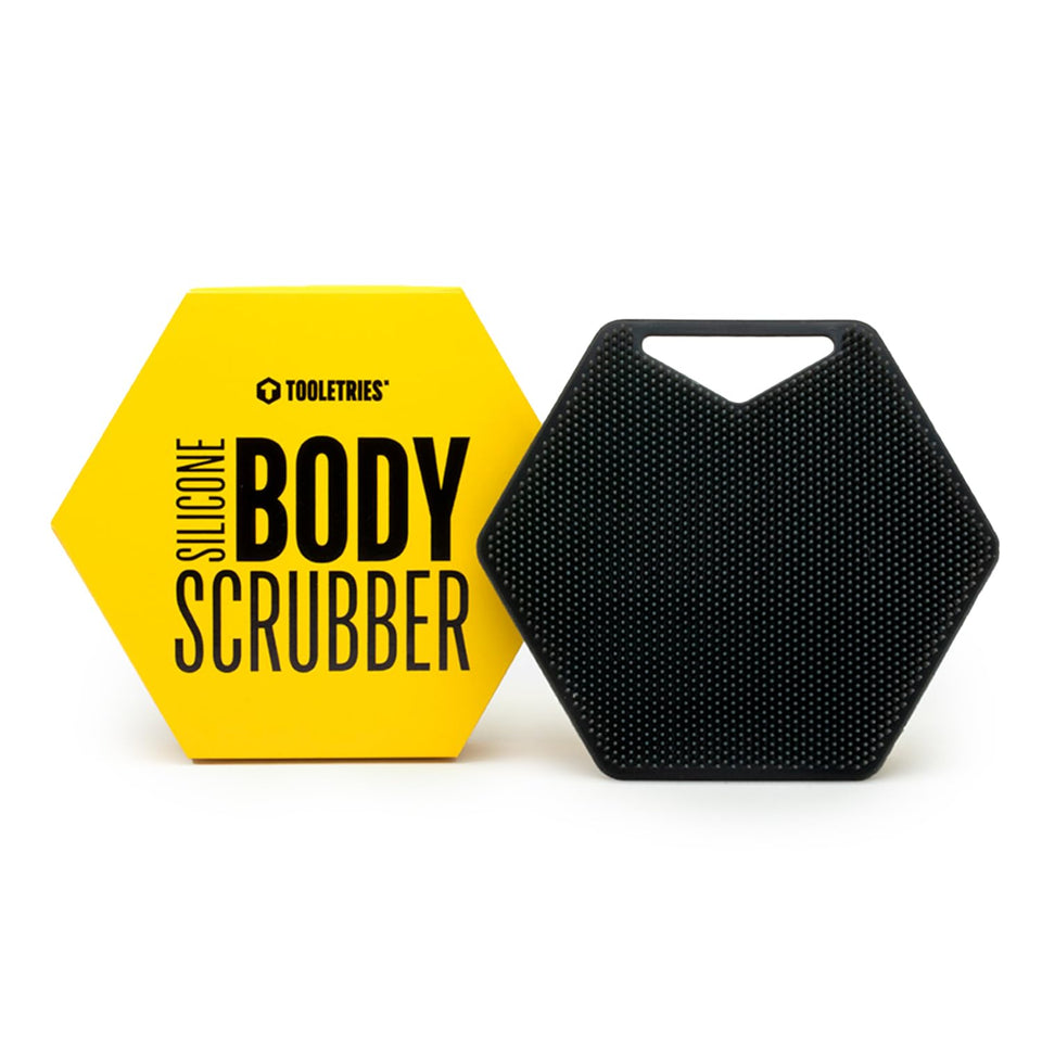 TOOLETRIES Body Scrubber close-up reveals bespoke bristles for deep cleansing.