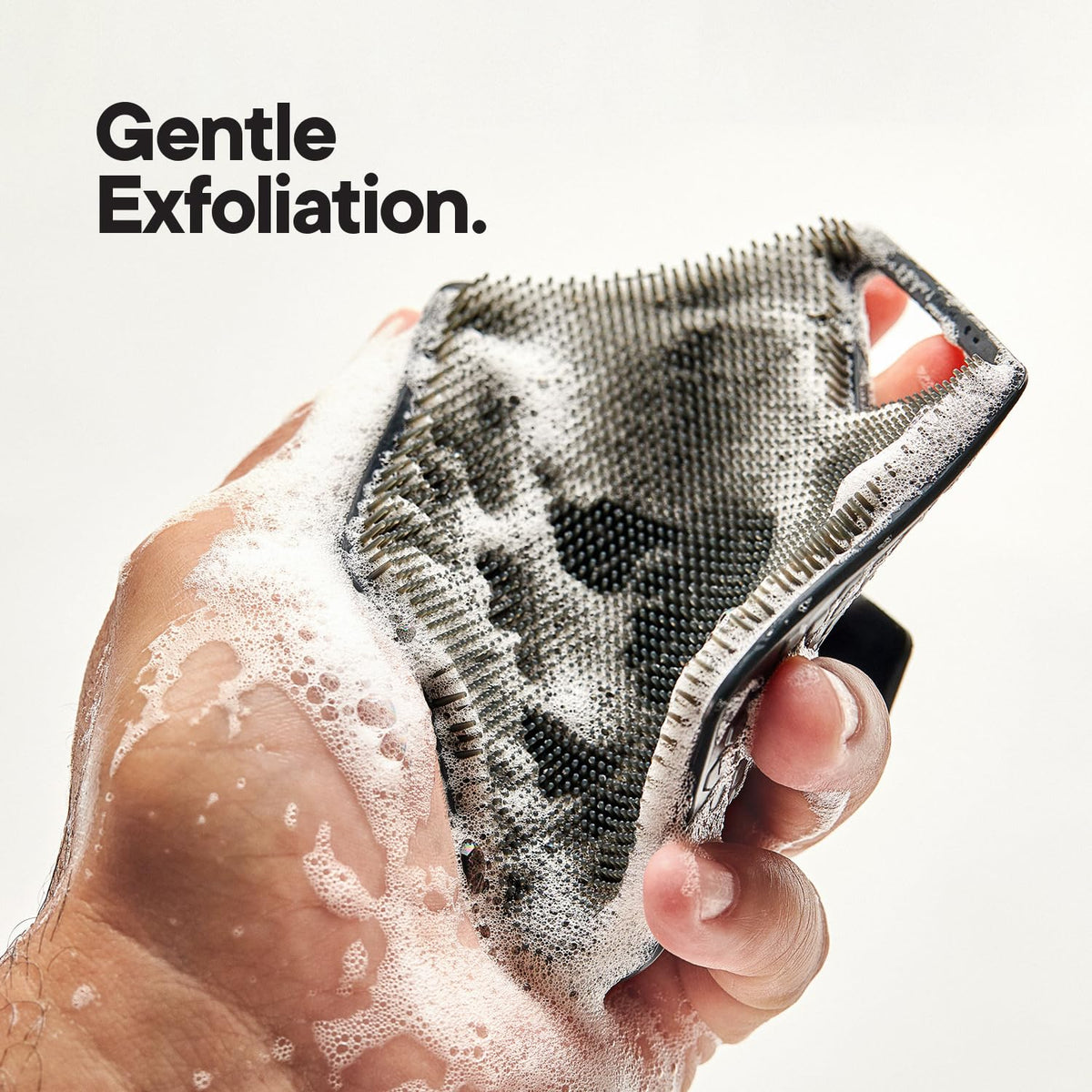 TOOLETRIES charcoal shower organizer keeping essentials within easy reach.