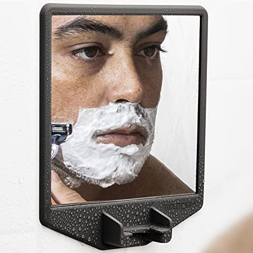 TOOLETRIES silicone-grip keeps Joseph mirror steady on shiny surfaces.