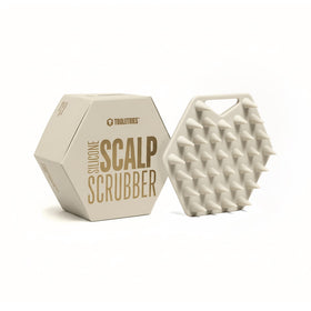 TOOLETRIES scalp scrubber with silicone bristles for gentle exfoliation and scalp stimulation.