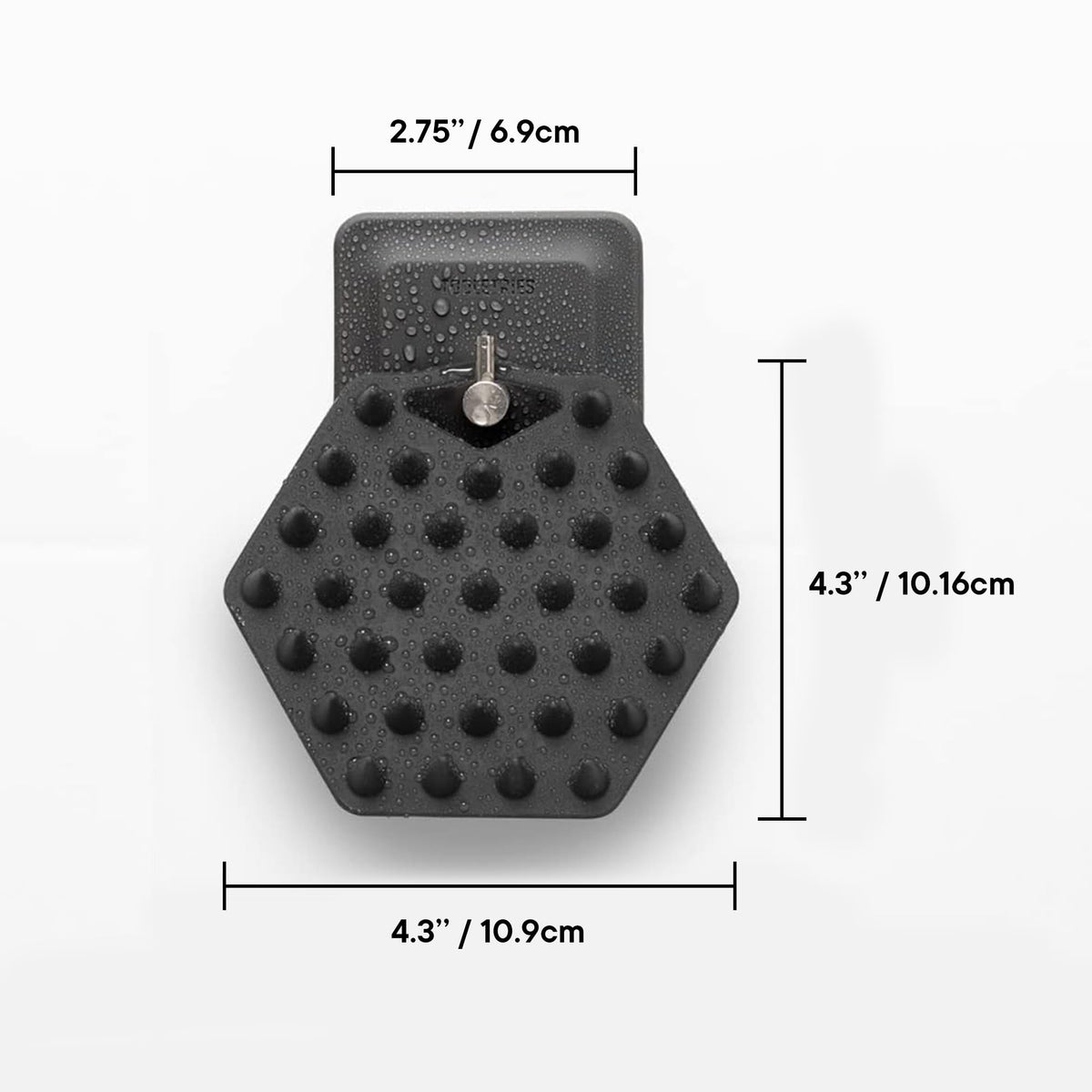 TOOLETRIES Shower hook with silicone grip keeps the scrubber secure on glass or tile.