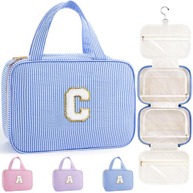 TOPEAST hanging toiletry bag in blue with letter C initial patch for organized travel.