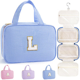 TOPEAST travel hanging toiletry bag in blue exterior keeps items neatly organized during travel.