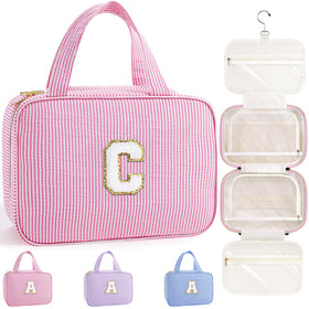TOPEAST travel hanging toiletry bag in pink with organized compartments for on-the-go trips