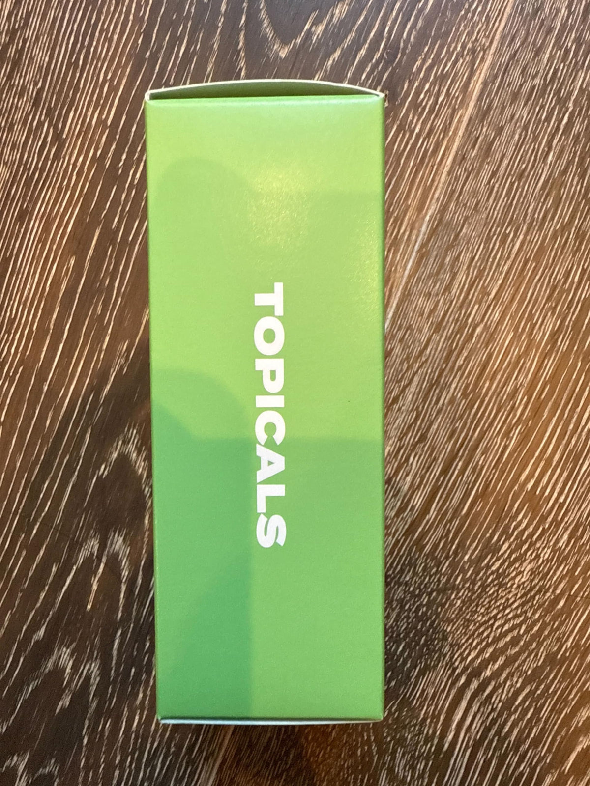 Topicals Clearly Acne Mist applied to the face for daytime skin care.