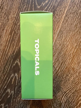 Topicals Clearly Acne Mist applied to the face for daytime skin care.