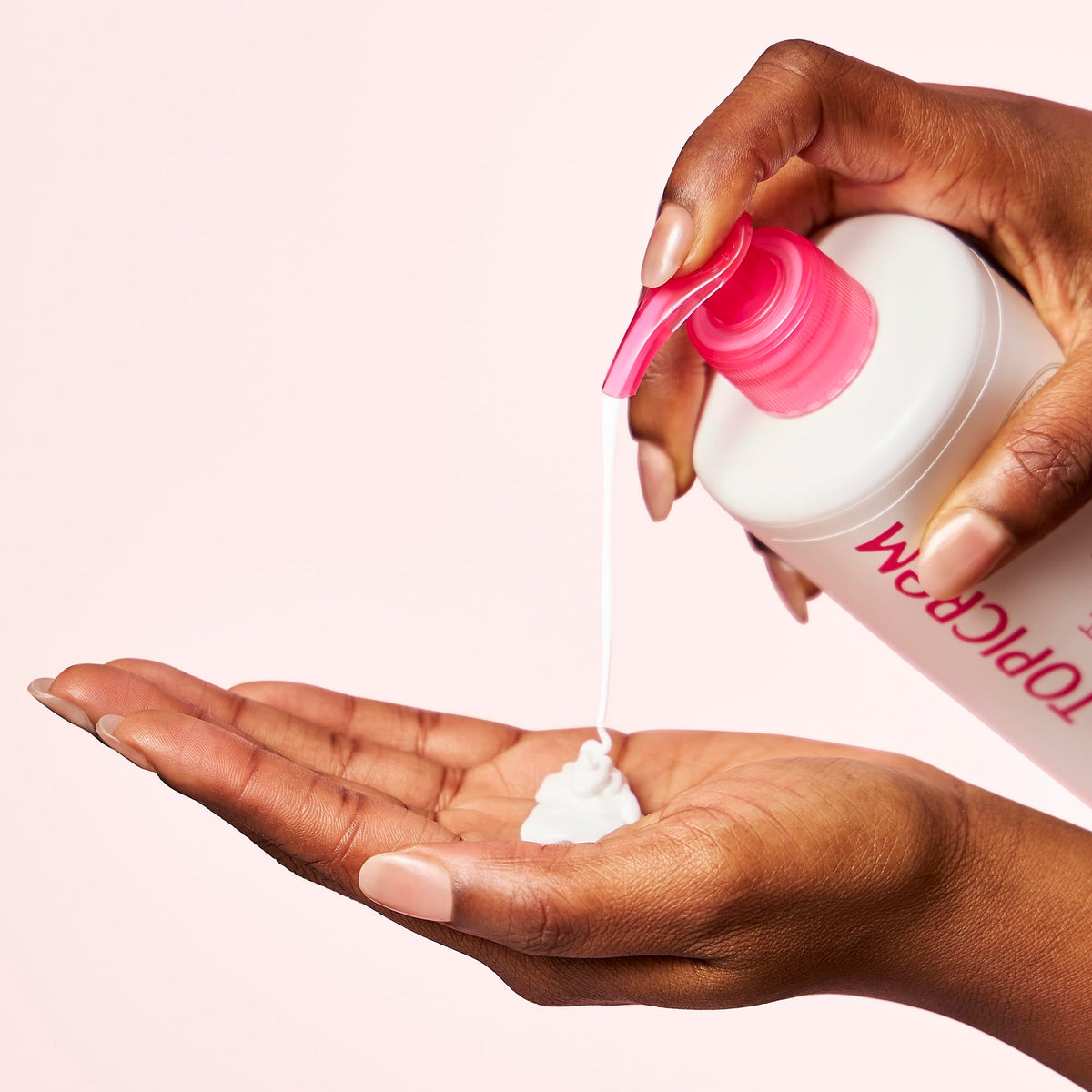 Topicrem Ultra-Moisturizing Body Milk on-skin application shows instant hydration and softness
