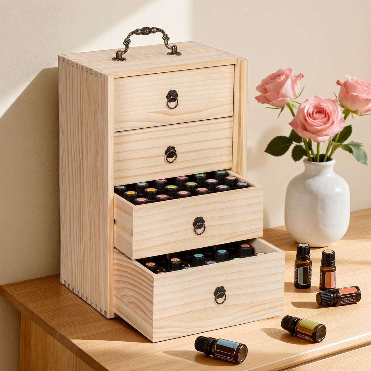 TORIBIO wooden oil box with four drawers for easy bottle access.