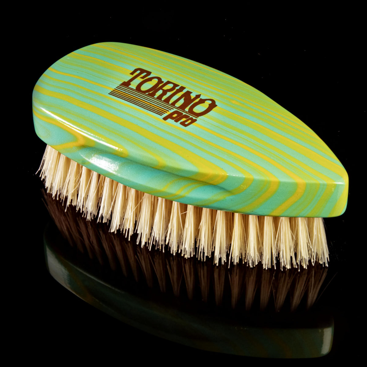 Torino Pro Wave Brush #242 black bristles offer firmer feel for controlled stimulation.