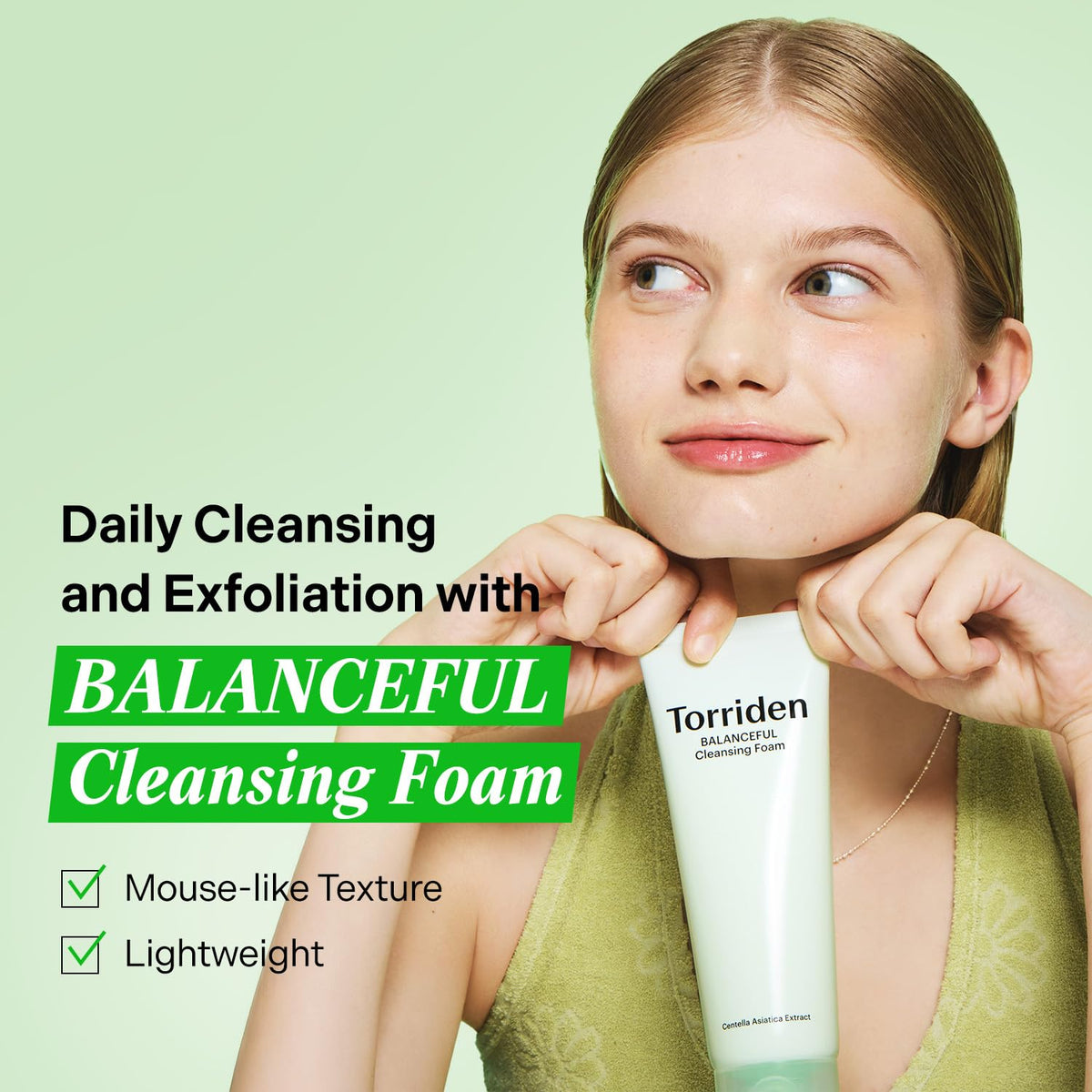 Applying Torriden Balanceful foam on the face for gentle pore cleansing and oil control.