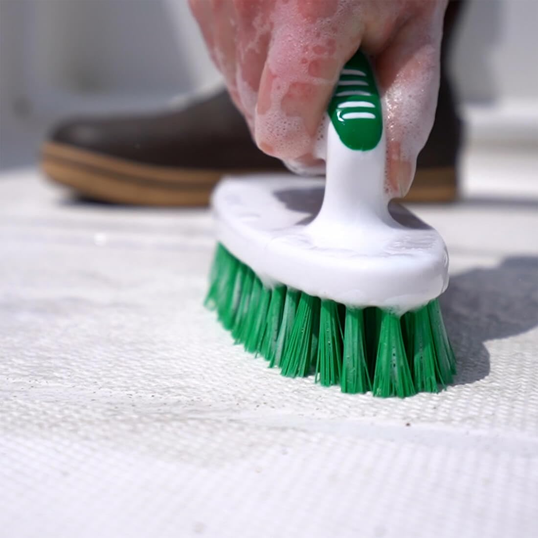 TotalBoat biodegradable cleanser on hull and sails delivers thorough cleaning.