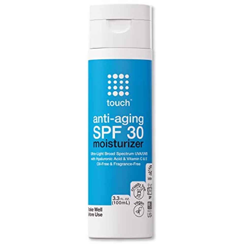 TOUCH Age Defying SPF30 sunscreen cream bottle shows quick absorption and invisible finish.