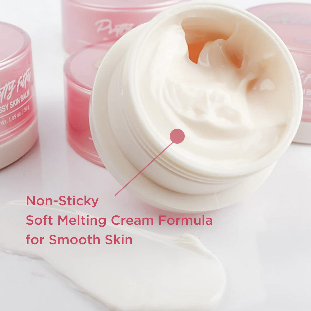 Hand applying balm on cheek to create radiant makeup base
