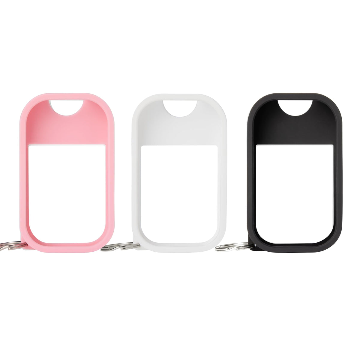 Touchland protective silicone case trio in white, pink, and black keeps 1 oz sanitizer accessible on the go.