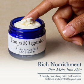 Nighttime routine moment with balm applied to face and neck.