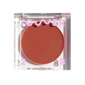 Tower 28 BeachPlease Power Hour cream blush on cheek for dewy sun-kissed glow