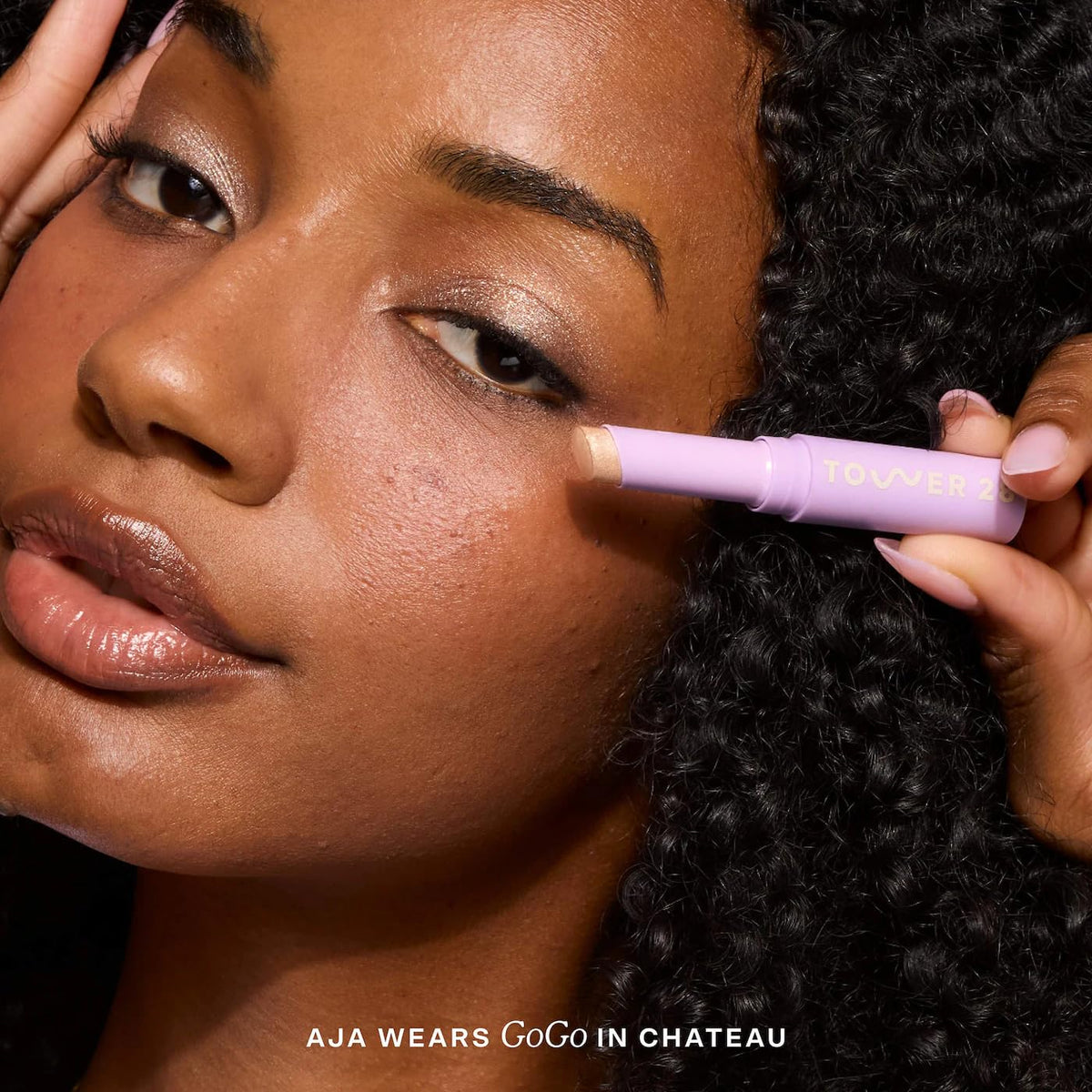 Tower 28 GoGo highlighter-use on cheekbones for glow.