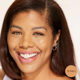 Tower 28 Swipe Serum Concealer under-eye application demonstrates brightening potential