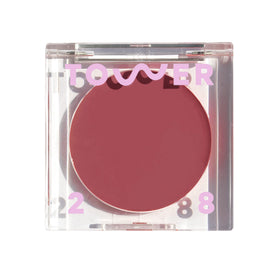 Tower 28 BeachPlease cream blush lip balm tube showing versatile color for cheeks and lips