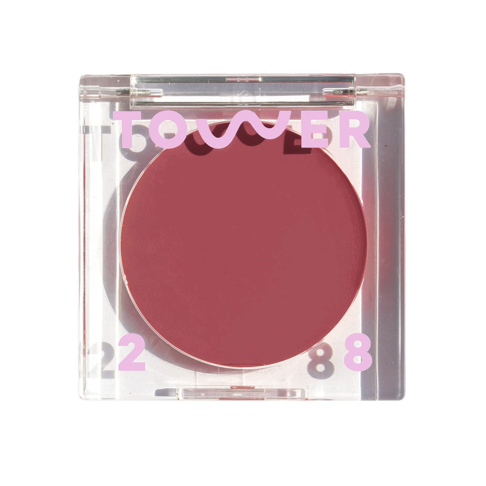 Tower 28 BeachPlease cream blush lip balm tube showing versatile color for cheeks and lips