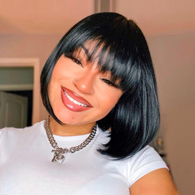 Toyotress short bob wig with bangs in jet black for daily styling.