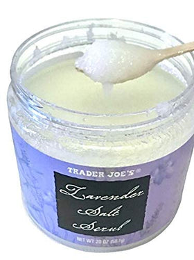Close-up of lavender-scented scrub texture and shimmering salt granules.