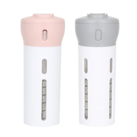 Travigo 4-in-1 travel dispenser set in pink and gray for organized packing