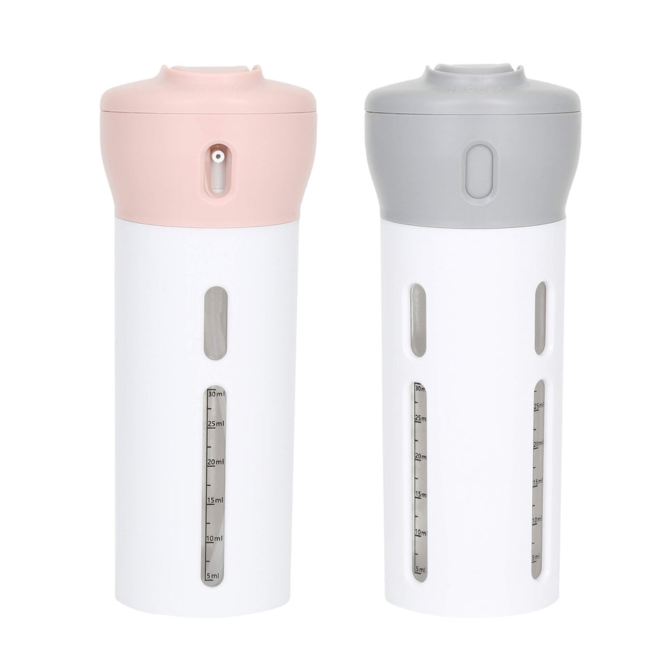Travigo 4-in-1 travel dispenser set in pink and gray for organized packing