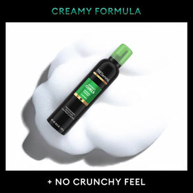 TRESemmé Flawless Curls Mousse diffusing for voluminous waves.
