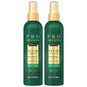 TRESemmé Pro Infusion Volume Tonic bottle close-up for sleek, voluminous styling.