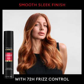 TRESemmé Protecting Heat Spray bottle shielding hair during high-heat styling.