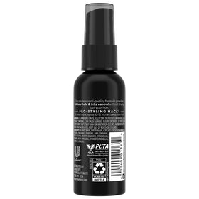 Close-up of TRESemmé travel hairspray nozzle for precise, mess-free styling.