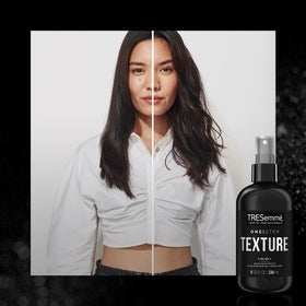 TRESemme hands spraying mist onto damp hair for flexible hold