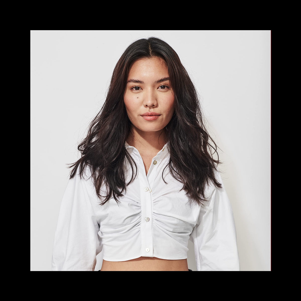 TRESemme texture mist displayed with styling tools for at-home professional look