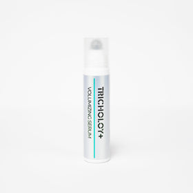 Tricholoy+ Volumizing Scalp Serum roll-on applied to roots for a fuller look.