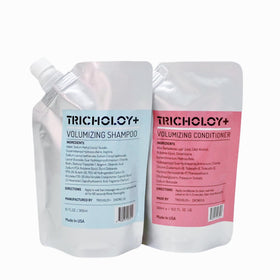 Tricholoy+ Volumizing Shampoo bottle pour boosts instant root lift.