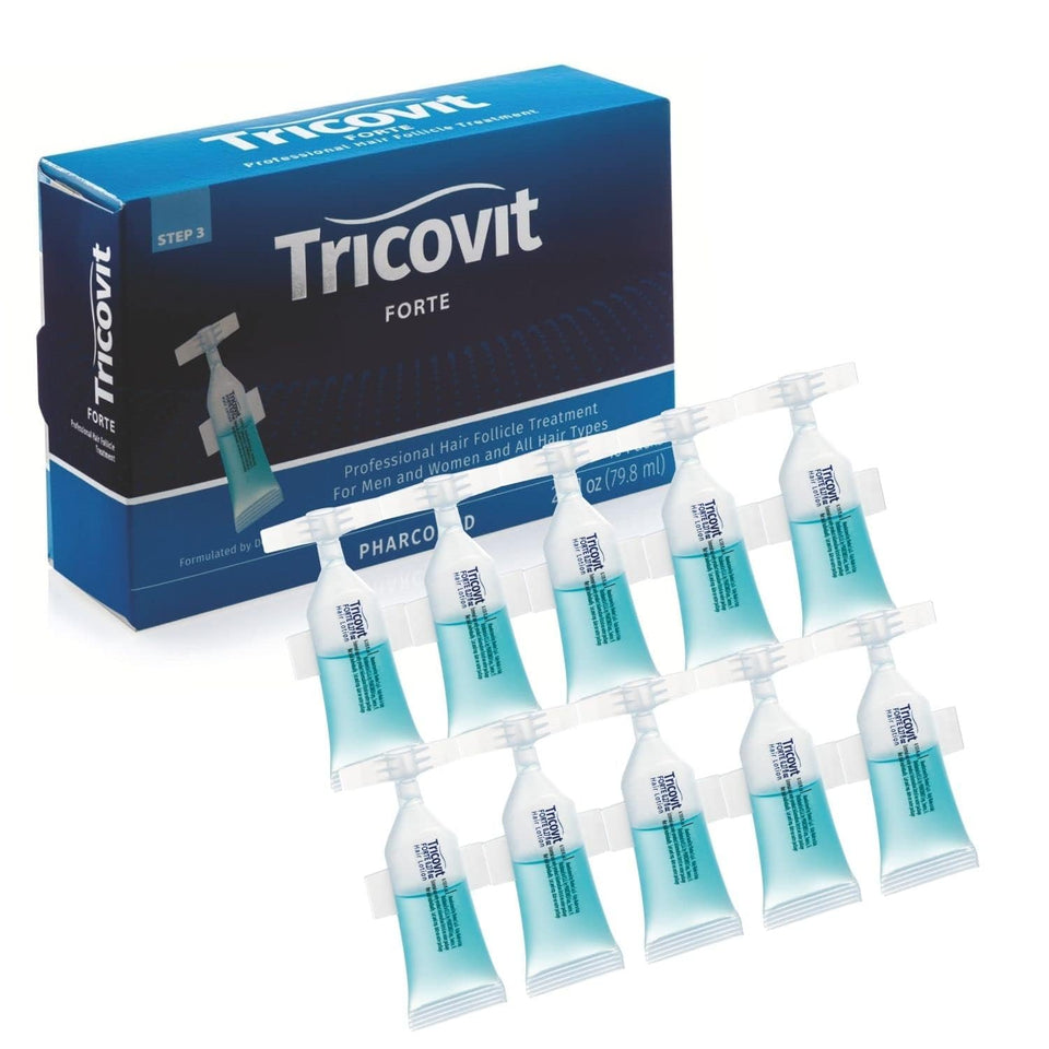 Tricovit Forte hair lotion ampoule bottle for precise scalp application and nourishment.