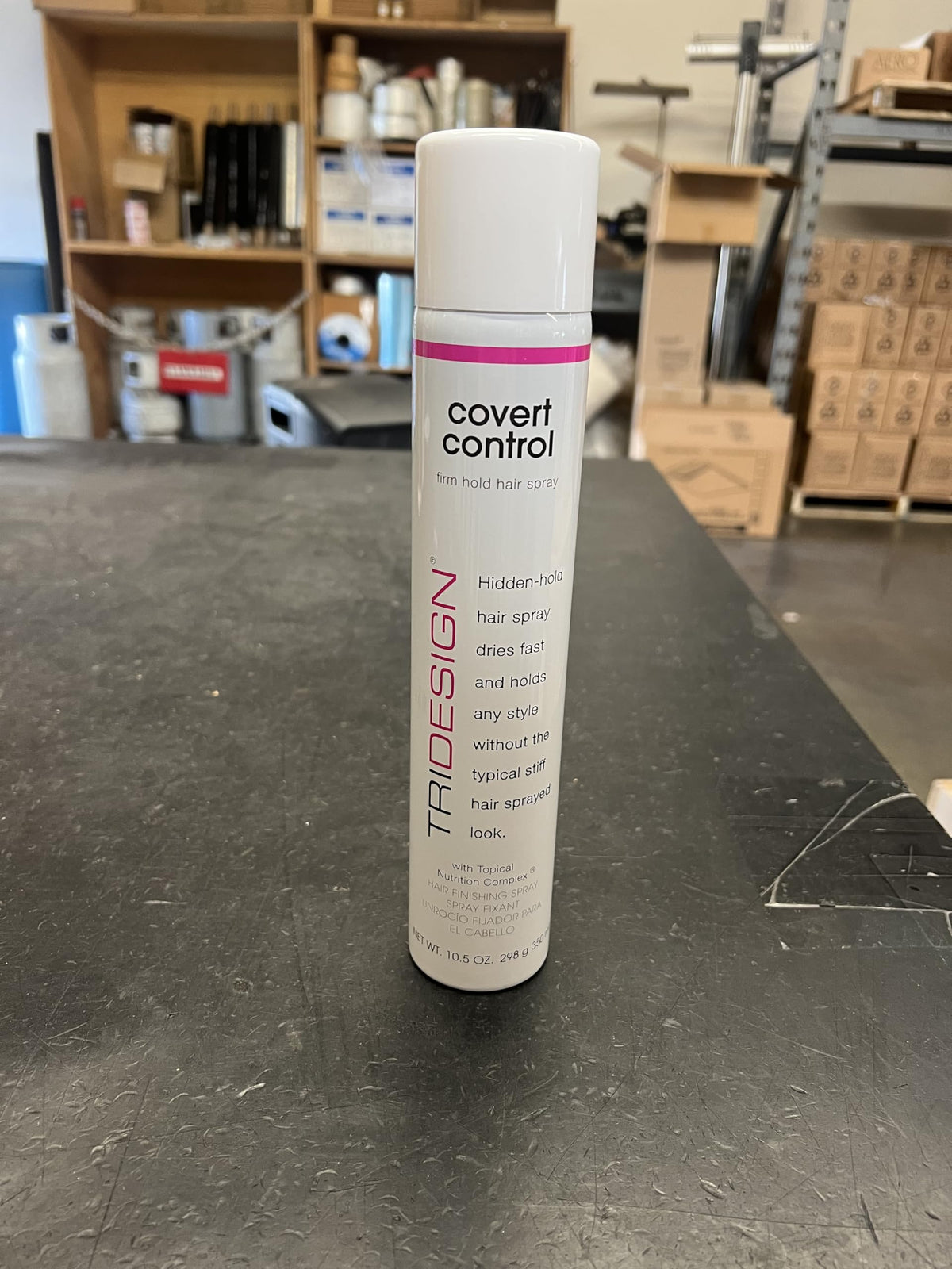TRIDESIGN Covert Control hairspray in action for flexible hold.