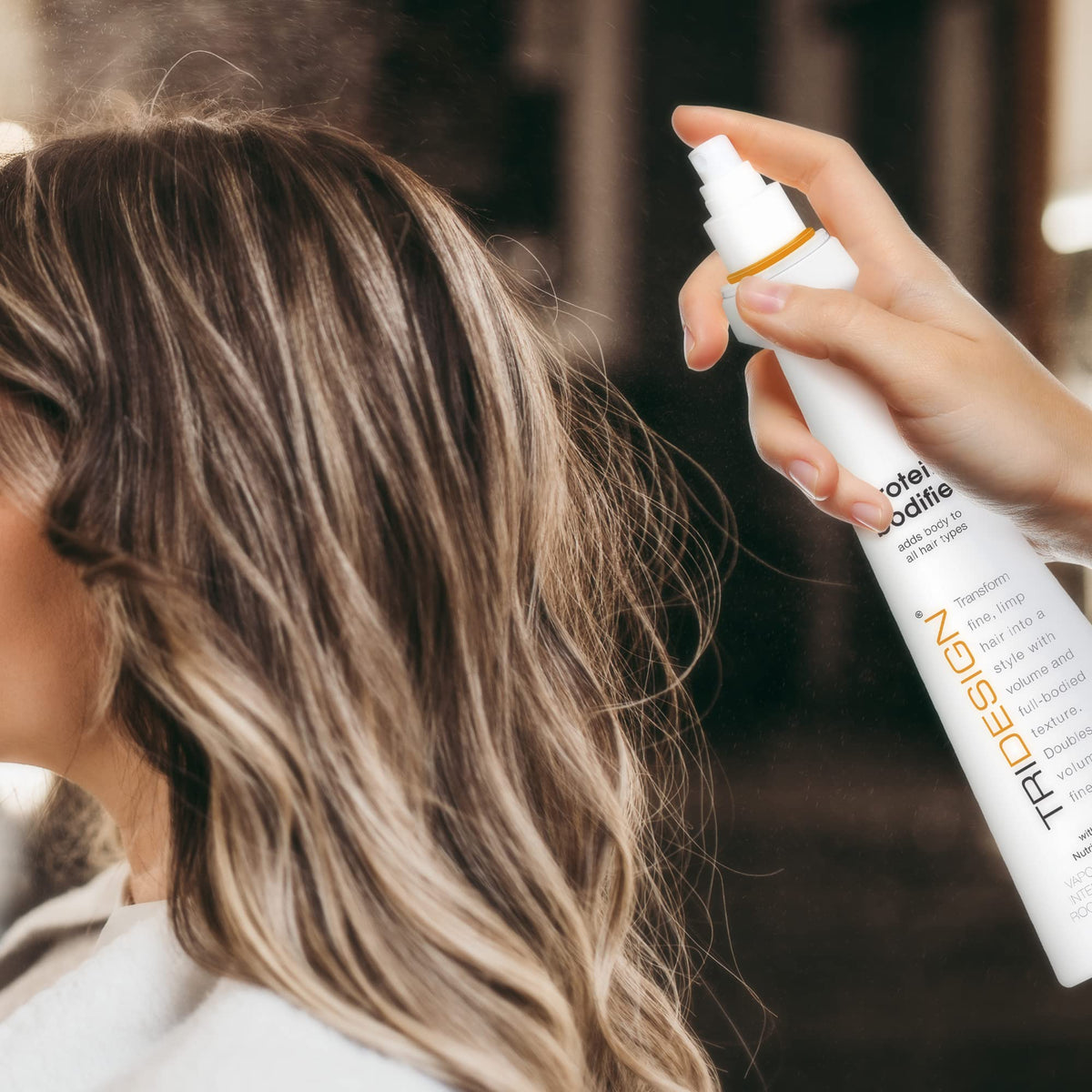 TRI Design Protein Bodifier-lift-focused-hair at crown after application.